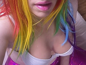 Sissy rainbow slut plays with her tits