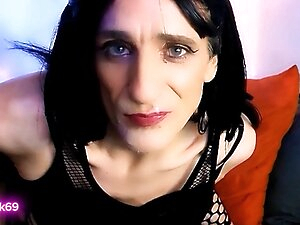 Mature trans mistress LuvNuk69 is wearings a crotchless black body stocking , bra and sporting a set of cat ears which give her a sexy feline look. She is sitting on the bed looking depressed and fed up so decides to masturbate to cheer herself up and whe