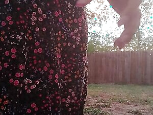 my sexy ass peeing in my pretty dress and heels in my backyard