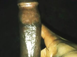 I pull my shorts down to play with my hairy big cock until it erect strongly