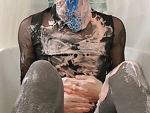 Crossdresser Kristy gets wet and messy with strawberry cake batter.