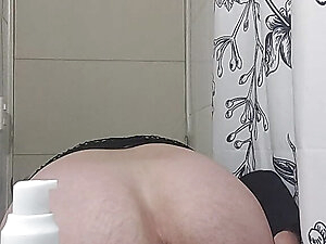 Enjoying a big ball and a plug inside my ass