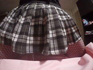 sneak peak under a girls Mini skirt