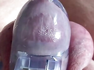 Closeup of chastity estimming no cum