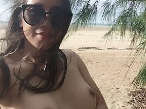 sexy hot ladyboy in the white sand beach masturbation
